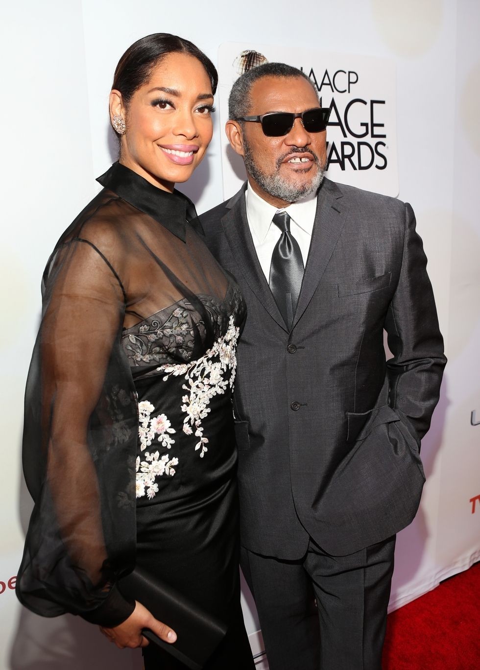 Gina Torres a Laurence Fishburne